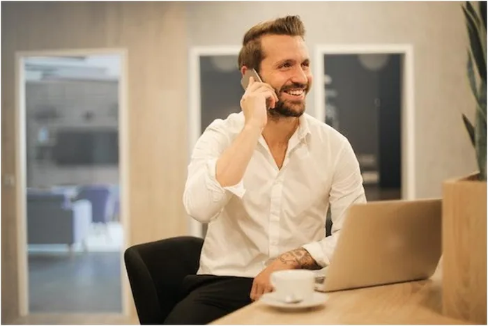 Realtor talking on the phone happy