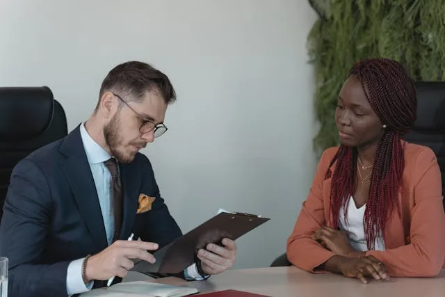 Two people inspecting a rental